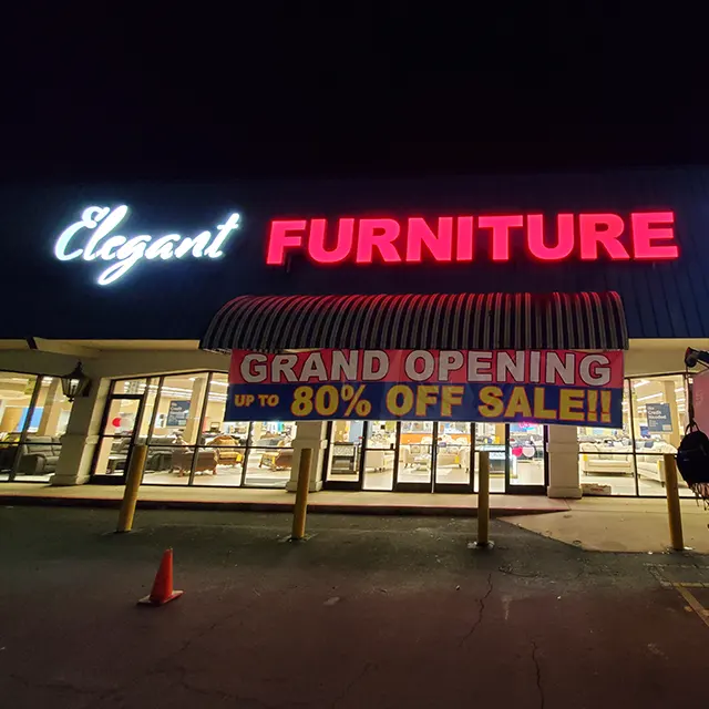 Illuminated large scale Elegant Furniture Sign lighted at night | Outdoor Signage | Channel Letter Signs | Sparks Sign Company