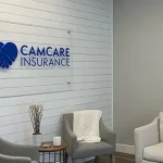 Camcare Medicare lobby wall sign made of printed vinyl and acrylic | Indoor Signage | Sparks Sign Company