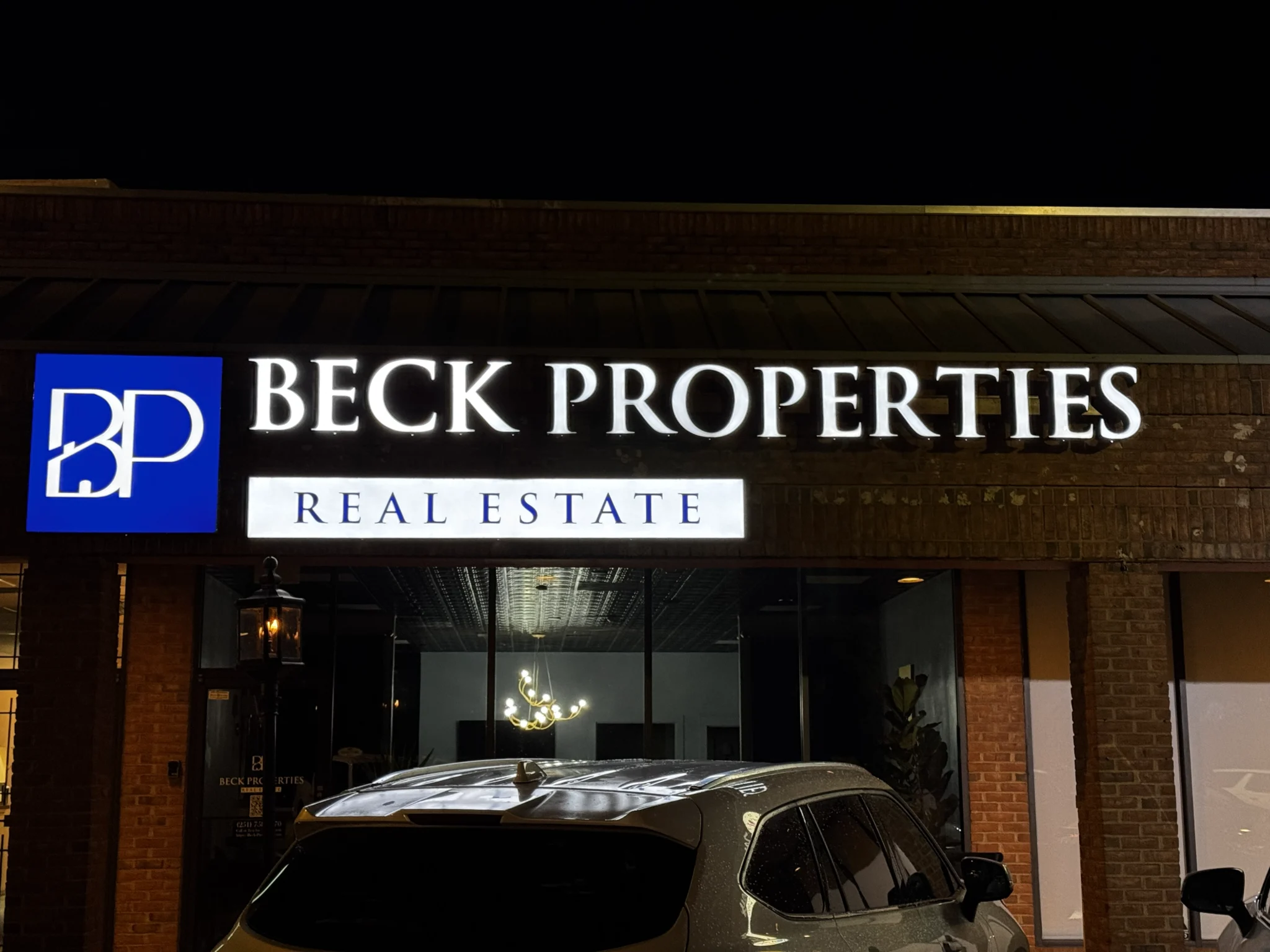 Sparks Sign Company | Beck Properties exterior sign at night