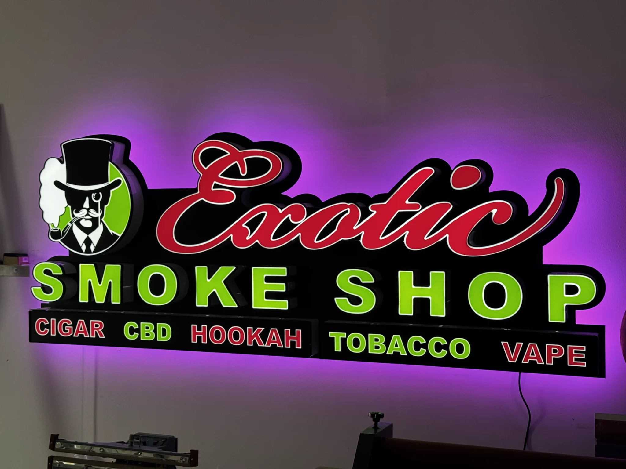 Sparks Sign Company | Exotic Smoke Shop exterior sign during build