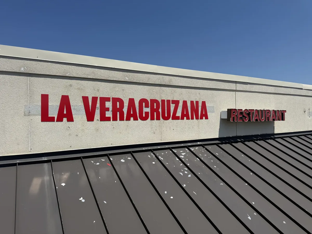 La Veracruzana Restaurant red channel letters on the fascia above a metal roof