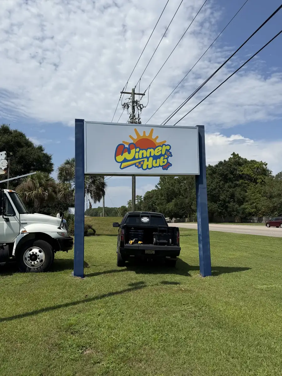 Winner Hub two-post sign with the cabinet face installed